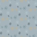 Christmas and New Year. Gold, light blue and navy blue snowflakes. Seamless vector pattern. Royalty Free Stock Photo